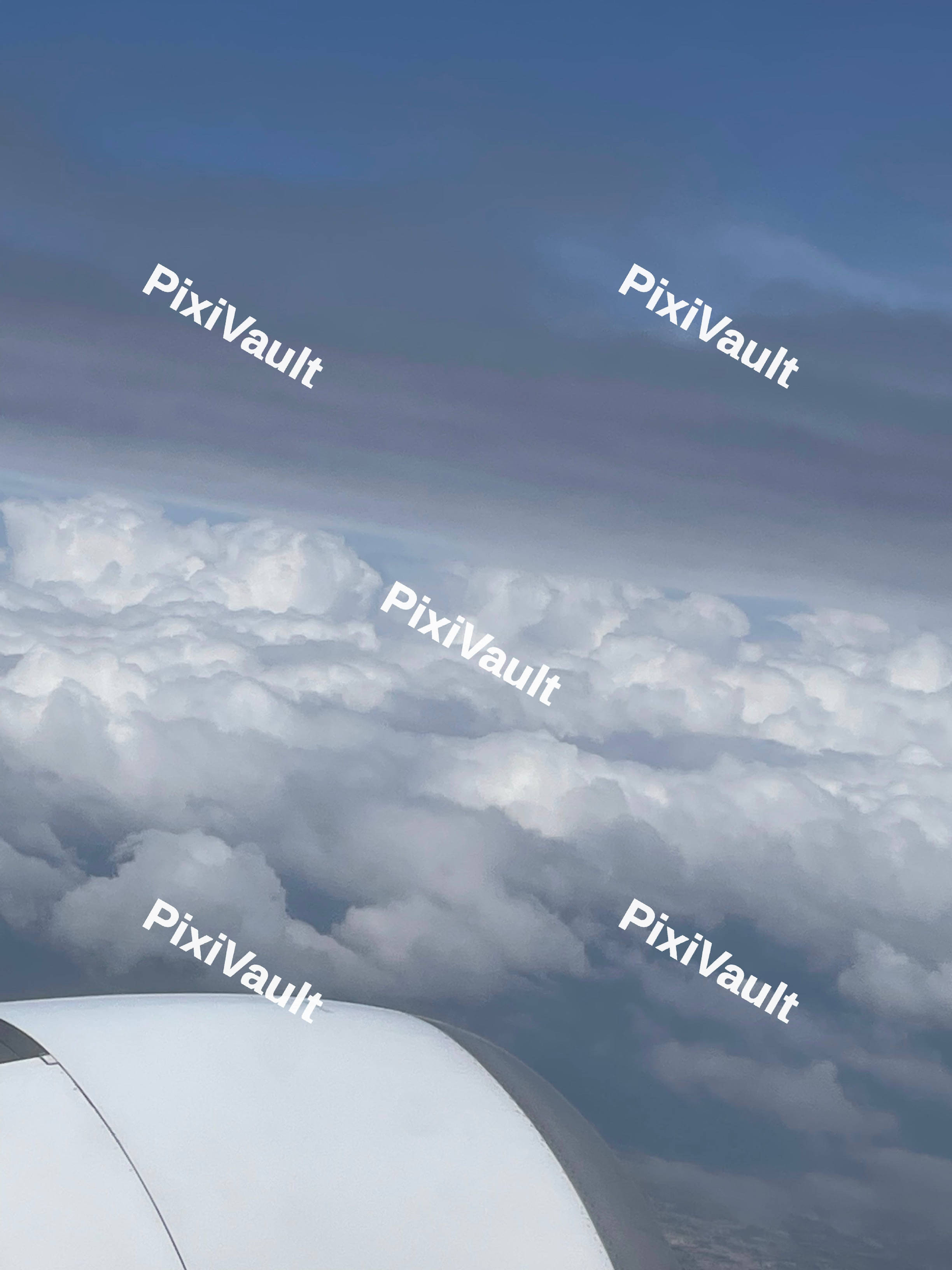 Grey Clouds On Plane